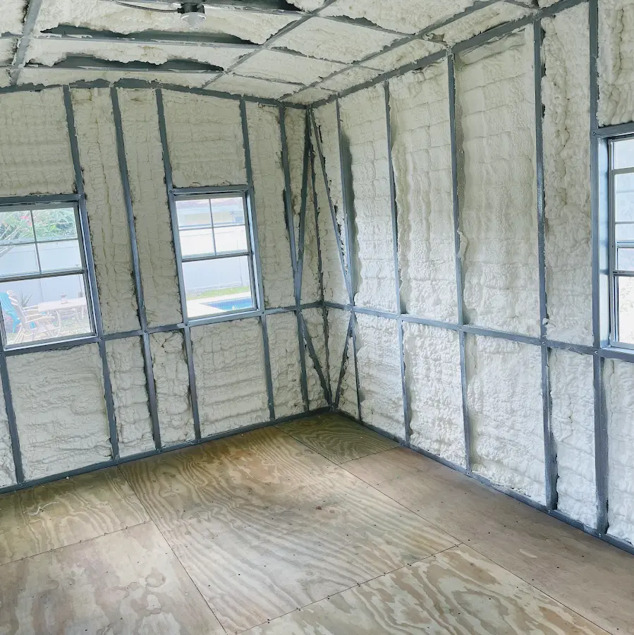 Closed-cell spray foam insulation applied to wall cavities in a residential project in Newmarket